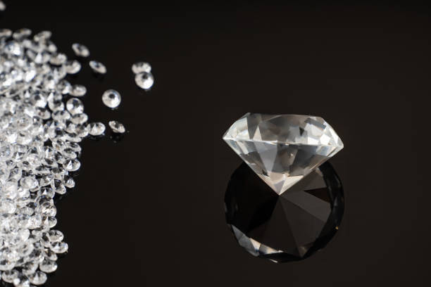 istock Brilliant or diamond gem on black background. 1317396454