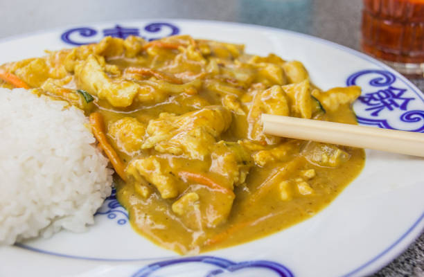 istock Chinese chicken in peanut sauce, served with rice 1317397869