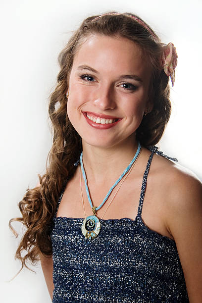 Portrait of a smiling pretty young girl with long hair stock photo