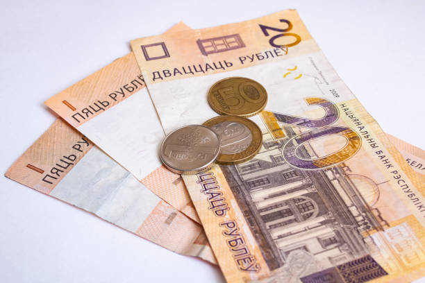 istock Belarusian money and coins on white background 1317402213