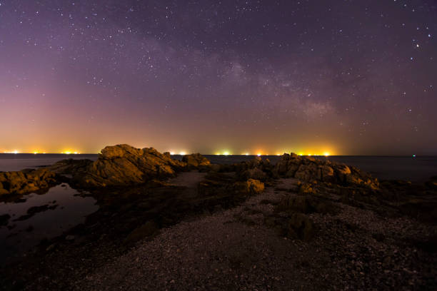 istock sea at night and beautiful Milky Way 1317404011