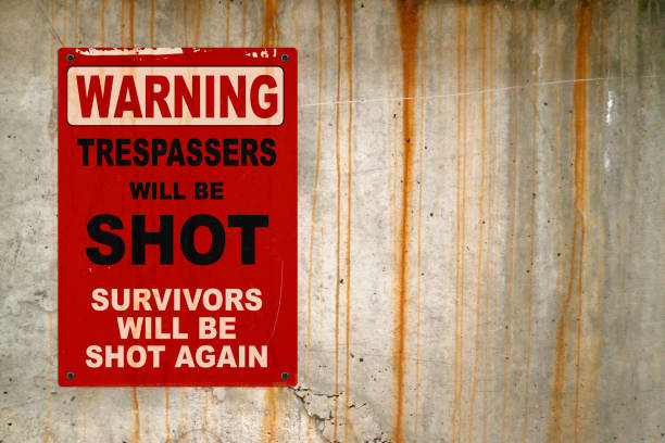 istock Warning - Trespassers will be shot, survivors will be shot again 1317405630