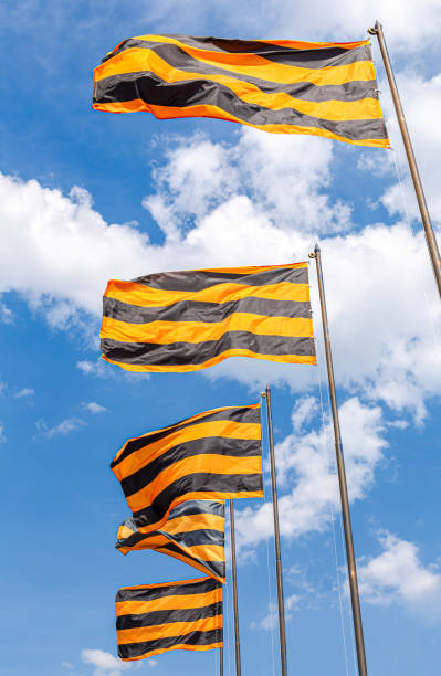 istock St. George flags of victory waving in the wind 1317405707