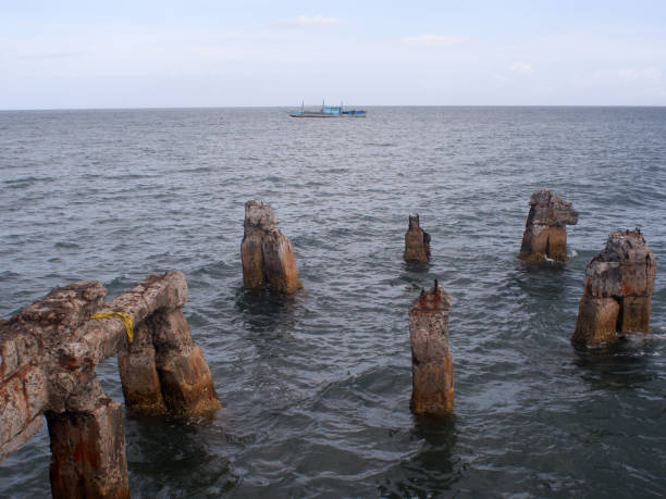 istock Concrete pier remnants left by strong typhoon sea waves 1317408499
