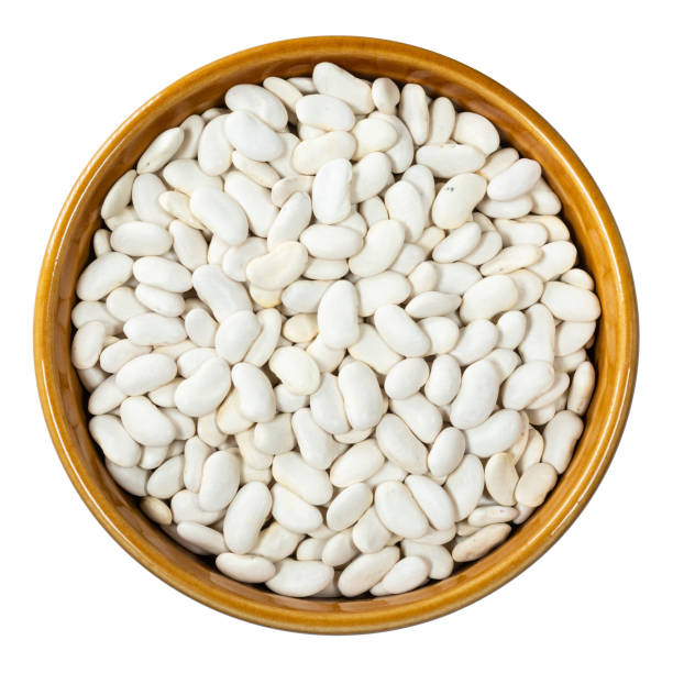 istock white beans in round bowl cutout on white 1317409740
