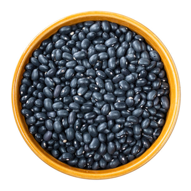 istock black mexican beans in round bowl cutout 1317409757