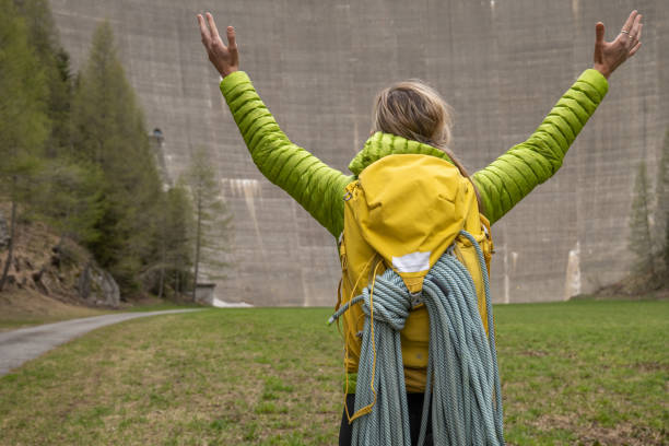 istock Female mountain climber at dam 1317410009
