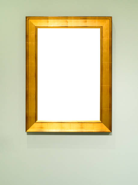 istock vertical flat golden picture frame on green wall 1317414373