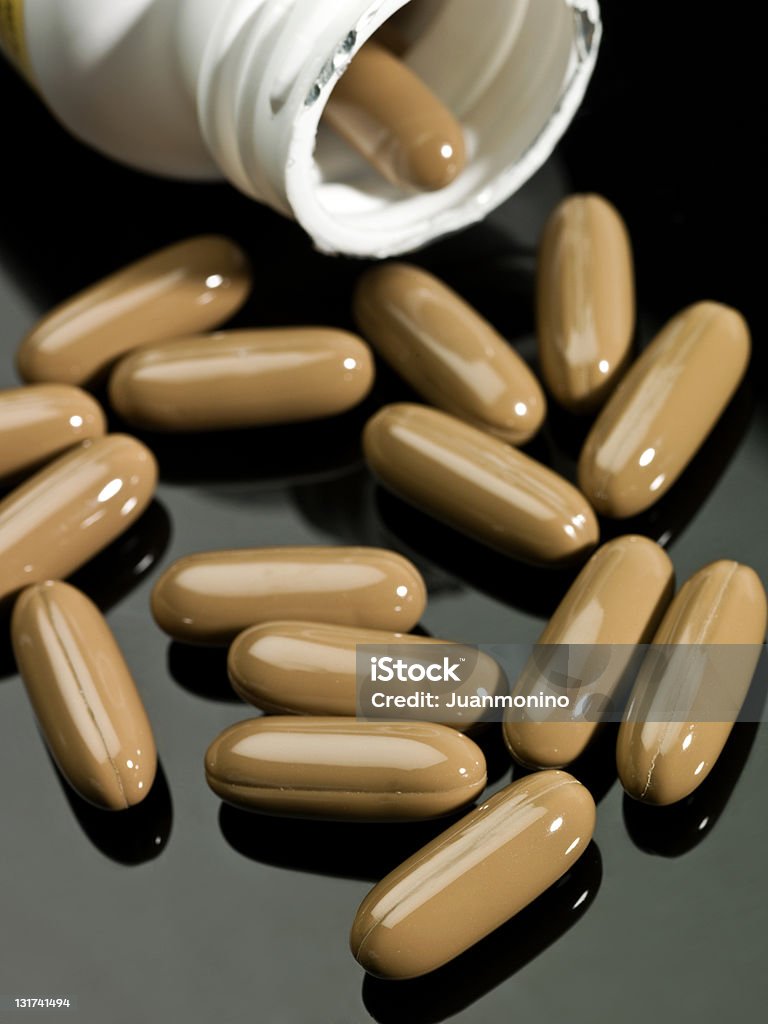 Le capsule di gelatina marrone - Foto stock royalty-free di Accessibilità