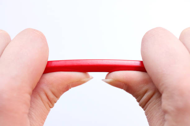 istock reaching breaking point. A pencil under pressure about to break 1317415647