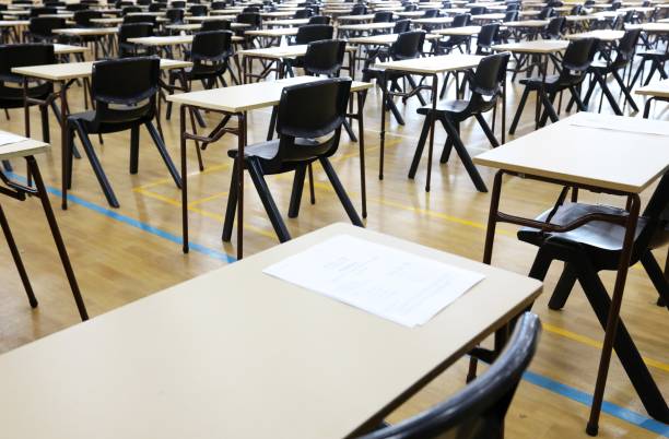 istock view of exam tables set up in an examination hall 1317416761