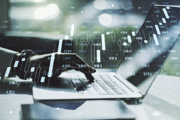 istock Double exposure of abstract creative statistics data hologram with hands typing on laptop on background, analytics and forecasting concept 1317418277