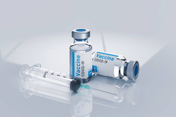 istock Ampoules vaccine from coronavirus with syringe 3d render illustration on white. 1317418352