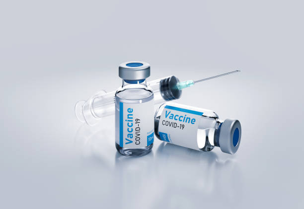 istock Ampoules vaccine from coronavirus with syringe 3d render illustration on white. 1317418421