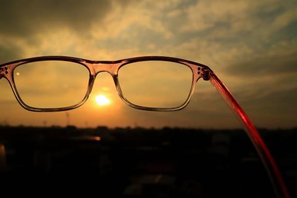 istock The eyeglasses with city in twilight sky background. 1317419945