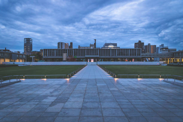 The Hiroshima Peace Memorial Museum in the evening with dramatic blue cloudscape, Hiroshima, Japan