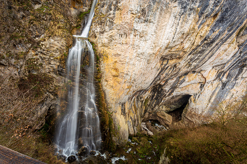 The biggest waterfall (25 meter in height) falling underground thru Dalbina cave. Photo taken on 30th of April 2021 in Vanatarile Ponorului, Trascau Mountains, Alba county Romania.