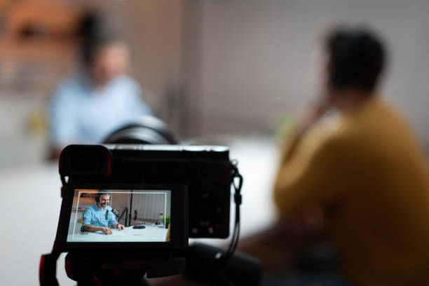 istock Digital camera recording a podcast in a studio 1317428298