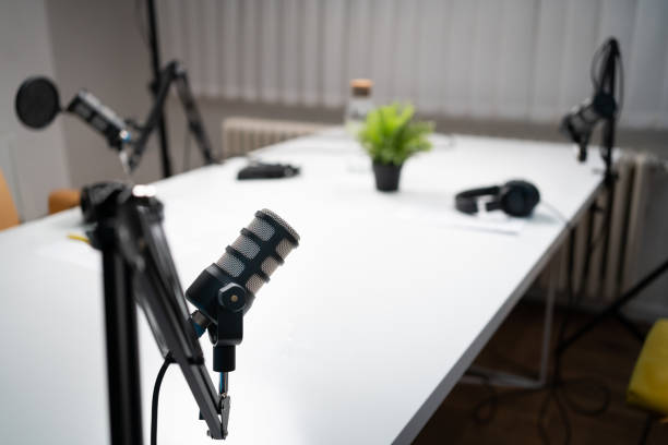 istock High-angle view of a microphone in a recording studio 1317428538