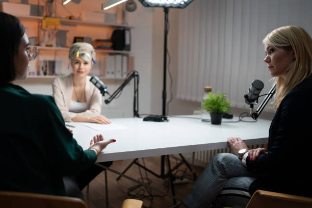 istock Women talking together while recording a new podcast episode 1317428610