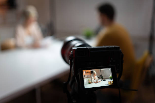 istock Digital camera recording a podcast show in a studio 1317428690