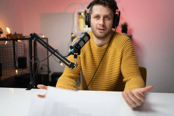 istock Portrait of a young man talking on the microphone 1317428733