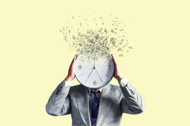 Businessman with a disintegrating clock instead of a head. Dispersion effect. Lack of time. Waste of time. Business. Lifestyle. Background