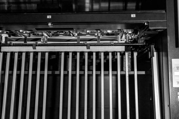 istock Close up of an offset printing machine during production. 1317443419