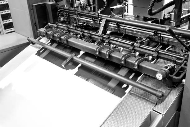 istock Close up of an offset printing machine during production. 1317443736