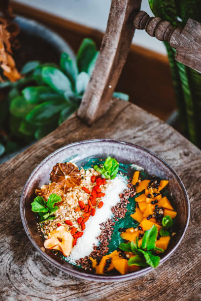 Green Spirulina Smoothie Bowl with different toppings