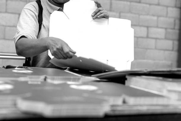 istock Close up of an offset printing machine during production. 1317449271