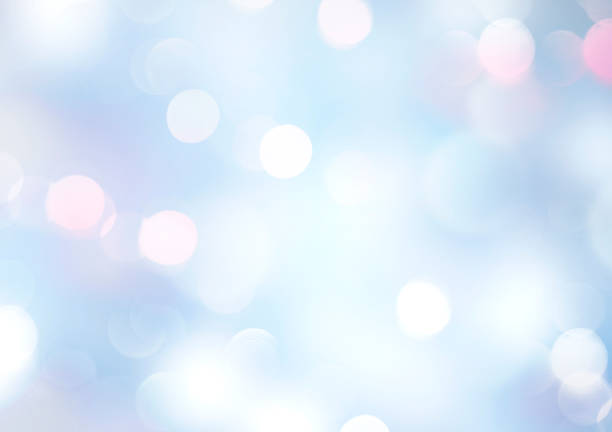 istock Soft lights blue blurred background.Winter backdrop,holiday texture.Glowing bokeh. 1317449304