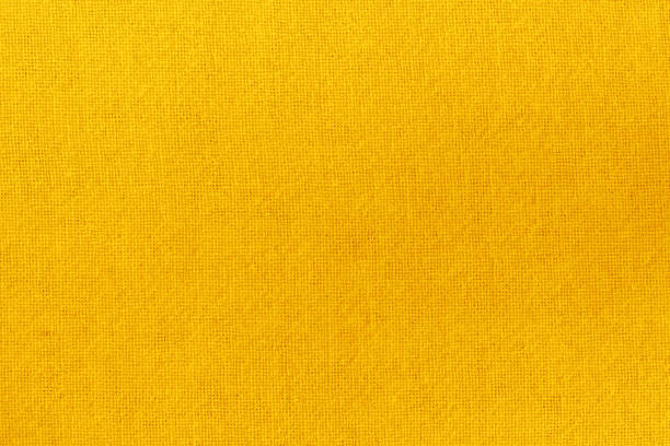 istock Golden yellow cotton fabric cloth texture for background, natural textile pattern. 1317451613