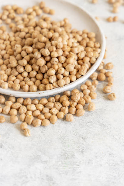 istock Plate of raw dry chickpea 1317453973