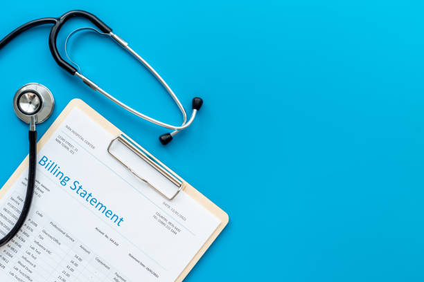 istock Medical billing statement with stethoscope. Top view 1317454991