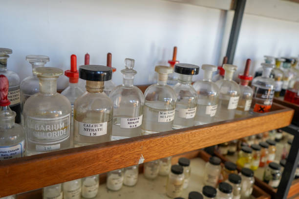 istock Bottles of chemicals in a science lab 1317455044