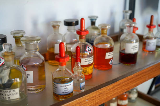 istock Bottles of chemicals in a science lab 1317457552