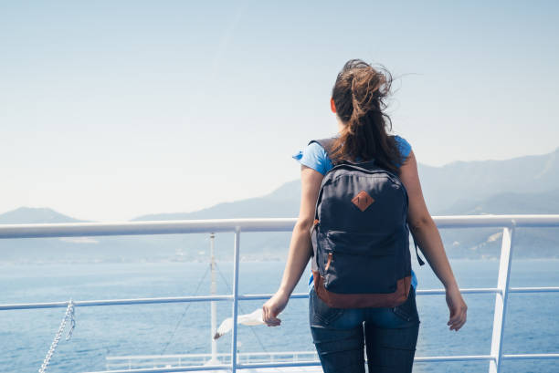 istock Young woman on a boat ride 1317458890