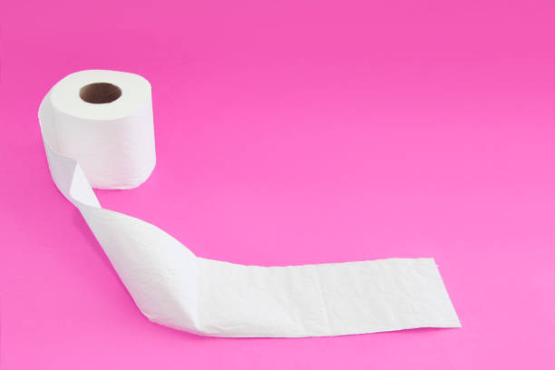 istock white toilet paper in a roll on a pink background 1317461839