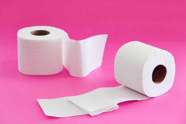 istock white toilet paper in a roll on a pink background 1317461844