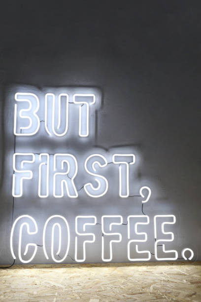 istock White neon sign but first coffee. Trendy style. 1317463198