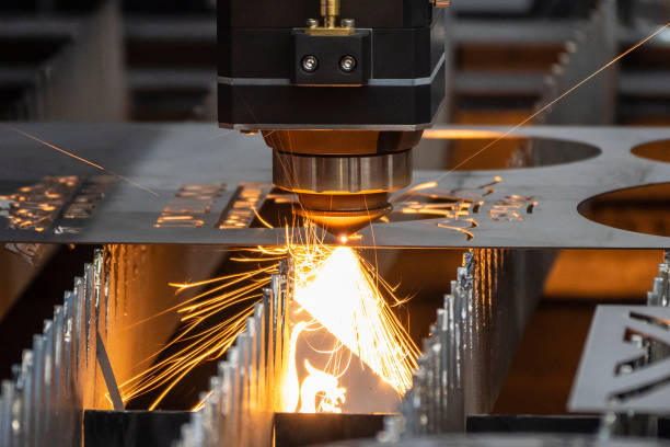 The fiber laser cutting machine cutting  machine cut the metal plate. stock photo