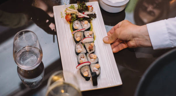 istock A few pieces of sushi with soy sauce on a table 1317466403