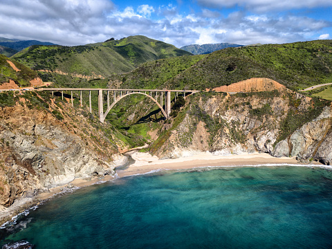 Aerial photo from the ocean side of the famed Bixby Bridge along California's scenic Highway 1 in Big Sur
