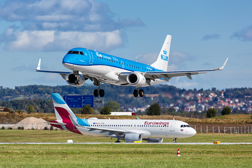 Stuttgart, Germany - October 4, 2020: KLM cityhopper Embraer 190 airplane at Stuttgart Airport in Germany.