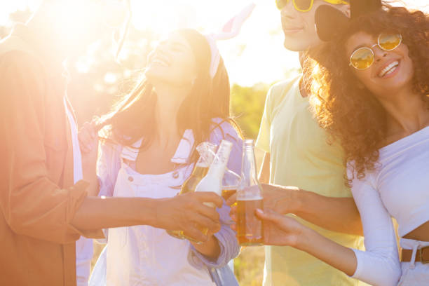 istock Happy friends spending free time together in park 1317468890