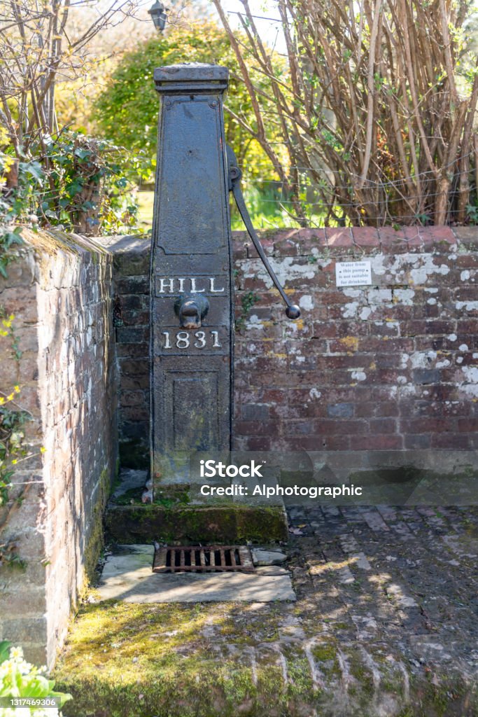 Public water pump in Hartfield, East Sussex. Public water pump in Hartfield, East Sussex, England, UK. Close by is Ashdown Forest. 2021 Stock Photo