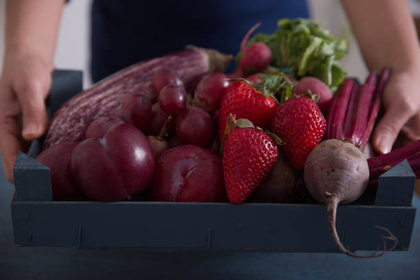 istock Fresh vegetables and fruits in reddish tones. 1317469338