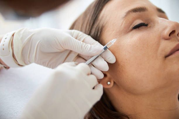 istock Dark-haired Caucasian woman undergoing a mesotherapy procedure 1317471916