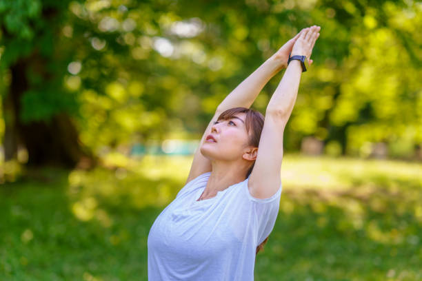 istock Beautiful woman practicing yoga in nature 1317476065